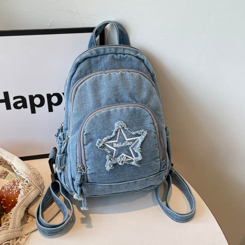 Women Bags Jeans - แฟชั่น Y2K กระเป๋าเป้สะพายหลังผ้ายีนส์ผู้หญิง กระเป๋าเป้ยีนส์สีน้ำเงินพร้อมแพทช์ดาวขาดๆ กระเป๋านักเรียนใหม่ กระเป๋าเดินทางแบบลำลอง